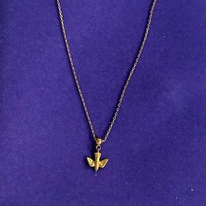 Agape Bird charm necklace. Gold plated.. tarnish resistant
